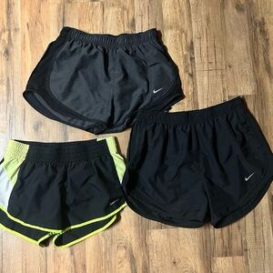 Nike Women's medium nike running, dri fit, shorts lot
